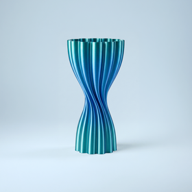 Lotus Vase Metallic in Teal Blue, a 3D printed vase with a twisted lotus-petal form